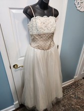 White tulle and lace gown with a gold beaded bodice David's Bridal Size 8