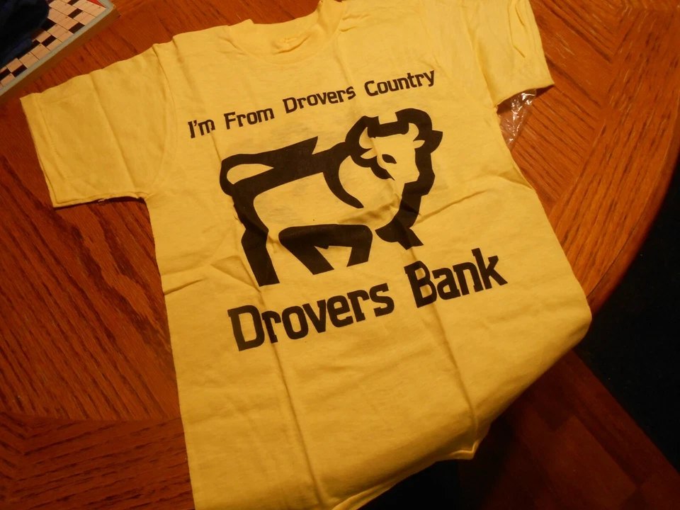 CAMISETA VINTAGE NIÑOS DROVERS BANK TALLA 10-12 AMARILLA NUEVA Foto 2 de 4