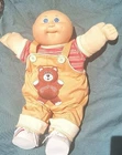 This is a vintage 1980s Cabbage Patch Kids boy doll