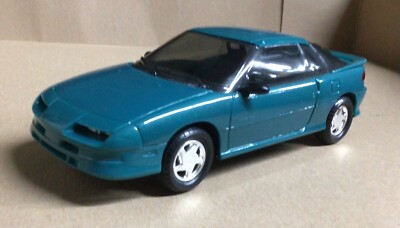 AMT 6963 1991 GEO STORM GSI Teal blue met. Dealer PROMO 1/25 McM
