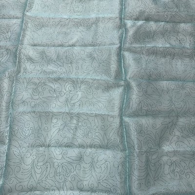 light blue metallic fabric with swirling glitter design. 72 x 59 