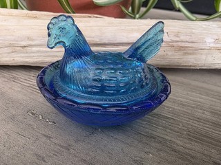 Mini Hen On Nest In A Light Blue