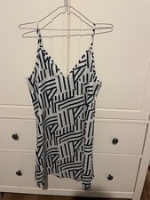 X2 slip shein dresses size medium. X1 animal print and x1 Aztec print. 
