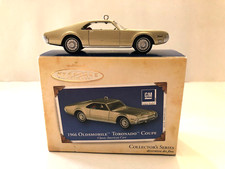 HALLMARK KEEPSAKE ORNAMENT 1966 OLDSMOBILE TORONADO COUPE FROM 2004