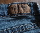 Signature Levi’s Denim Stretchy Jeans Women’s Sz 8 Med Midrise Skinny Boot Cut   — photo 4