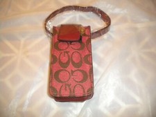 NEW RED  CELL PHONE POUCH WITH DESIGN AND A  STRAP FOR THE PURSE