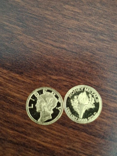 1/100 OZT .9999 GOLD LIBERTY HEAD WITH TORCH COIN