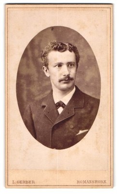 Fotografie L. Gerber, Romanshorn, Junger Herr im Anzug mit Oberlippenbart 