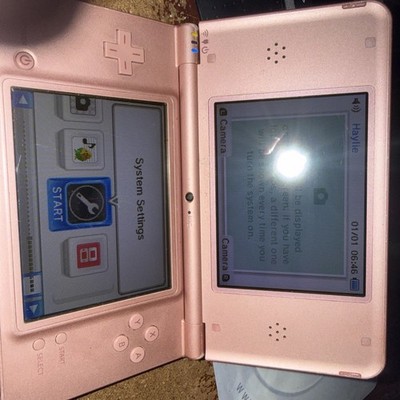 Nintendo DSi XL metallic rose Handheld System Built-in Camera NTSC No Stylus