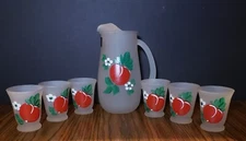 Hansetta Artware. Co Hand Painted Pitcher and glasses very nice