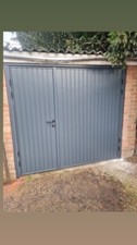 Small Vertical Rib Side Hinge Garage Door