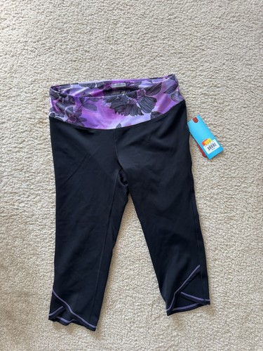 New Balance Women’s Lightning Dry Leggings  Size M Knee Length Purple Flower - Picture 1 of 3