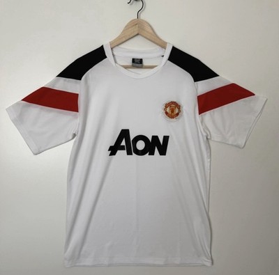 ￼ WEFA white medium Manchester United AON jersey