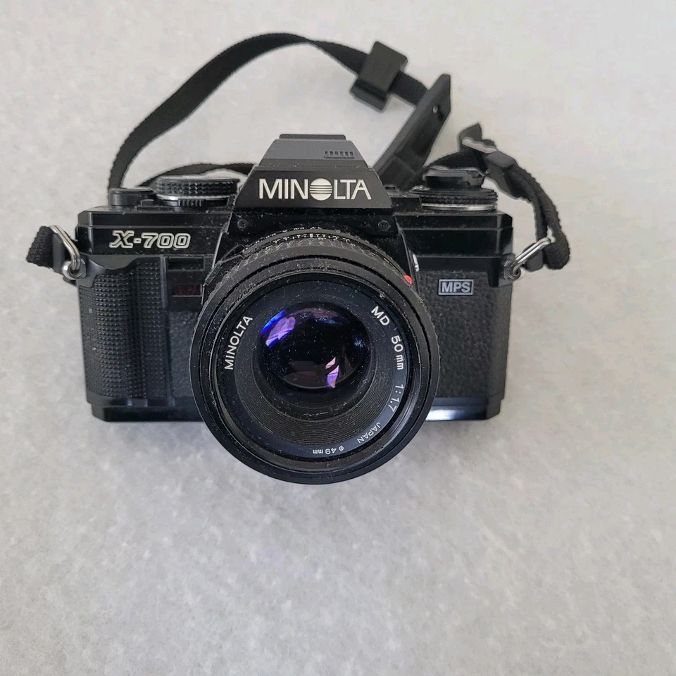 Cámara réflex de película Minolta X-700 35 mm con lente Minolta MD 50 mm, bucle original para el cuello Foto 2 de 4