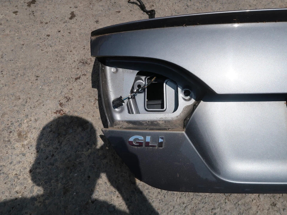 VOLKSWAGEN JETTA GLI 2011-2014 SEDÁN GENUINO MALETERO TRASERO TAPA ESCOTILLA GRIS OEM Foto 2 de 4
