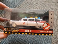 JADA TOYS HOLLYWOOD RIDES GHOSTBUSTERS ECTO-1 1959 CADILLAC MINT BOXED 1:32