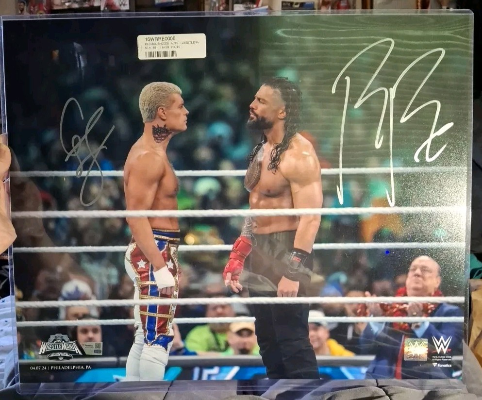 WWE Dual Autograph 16X20 Cody Rhodes Roman Reigns