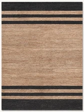 Hand knotted from spun jute, the rug offers high-low dimension and exceptional