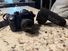 Panasonic LUMIX GH4 With 25mm 1.7 Lens and Rode Microphone