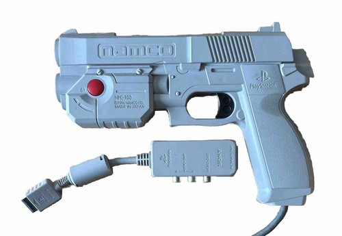 PISTOLA DE LUZ GRIS NAMCO G-CON NPC 103 1996 CON ADAPTADOR AV - SONY PLAYSTATION 1 - Imagen 1 de 3