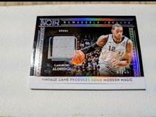 Lamarcus Aldridge 2018-19 Panini Noir Newsreels Jerseys #NJ-LMA /65 Spurs