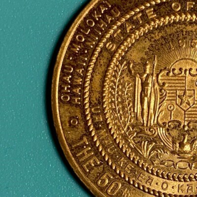 1959 HAWAII ERROR SPELLING ''OHAU'' ALOHA STATE $1 TRADE DOLLAR BRASS (not silver)