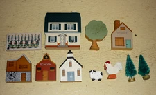 11 piece VILLAGE HOUSES shelfsitters. HOUSE / MILL / CHURCH / BAKERY / SCHOOL &
