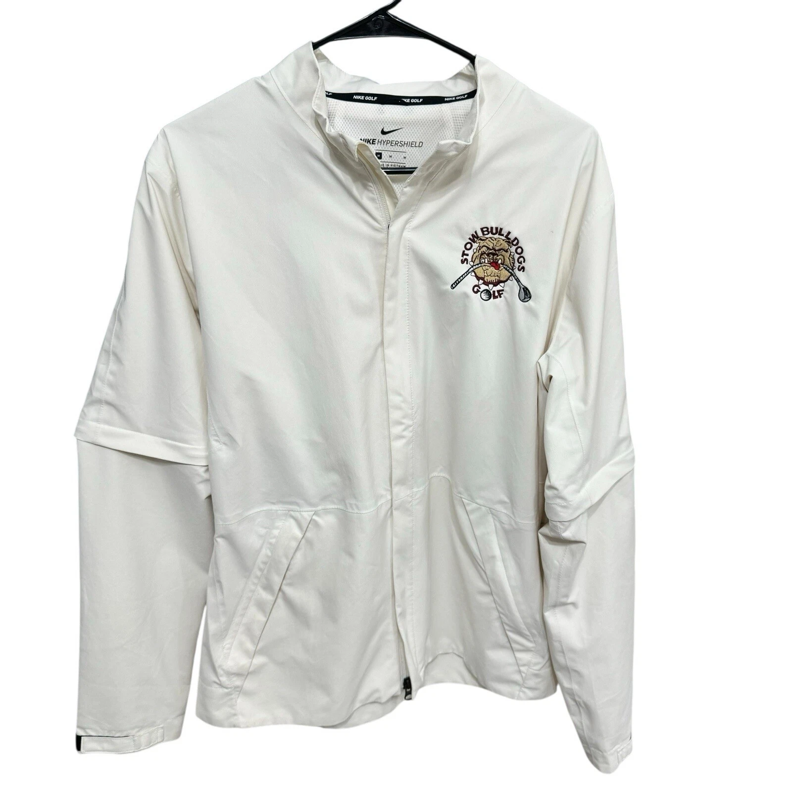OFF WHITE Giacca Nike Hypershield convertibile donna media zip. Il colore è bianco sporco.