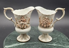 Two Vintage Lefton Footed Creamer Pitcher Set Girl/Flowers Reclining Boy