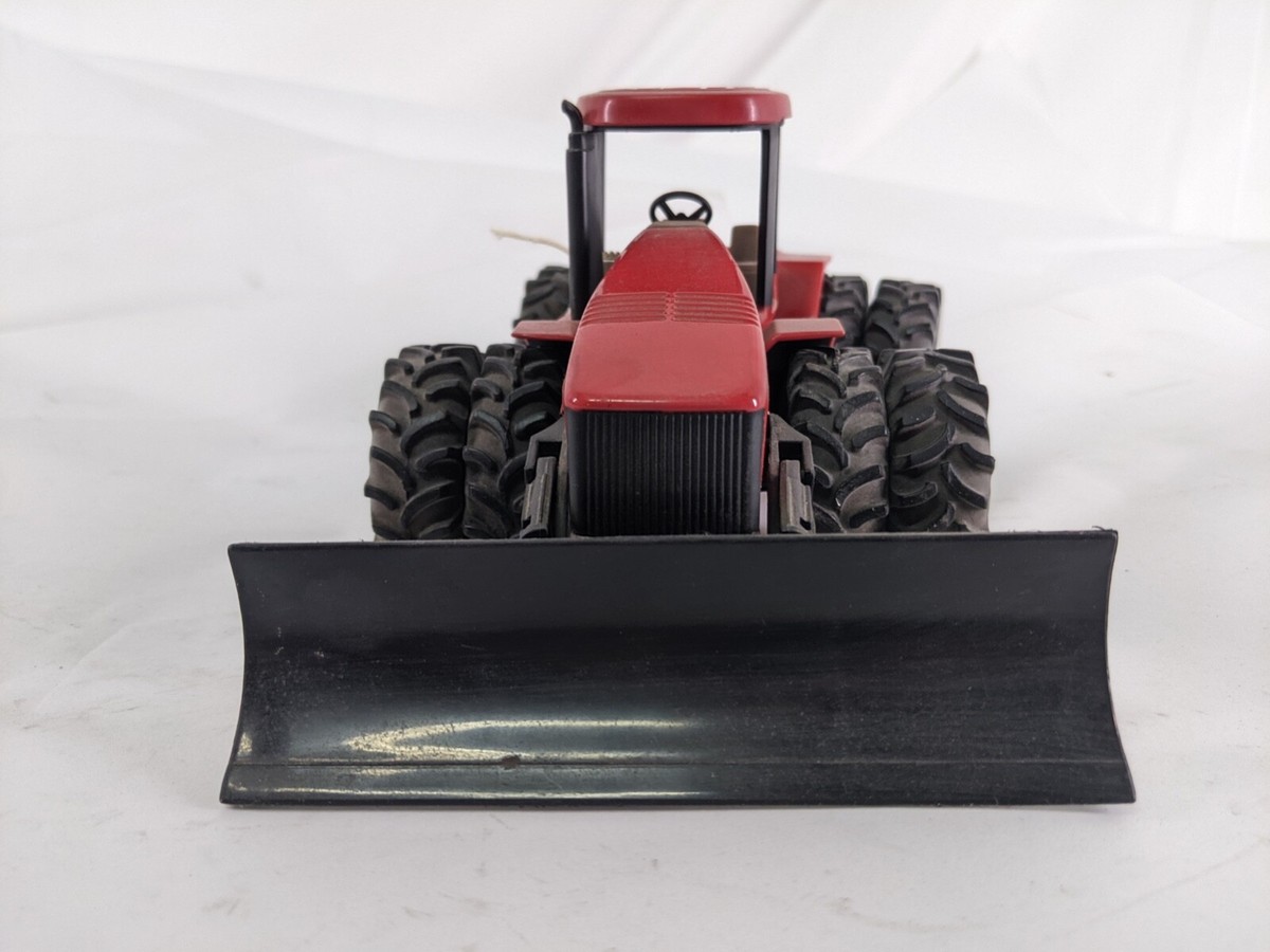Case IH Stx 500 Tractor With Plow (1:64 farm toy) RC2 Brands 2004