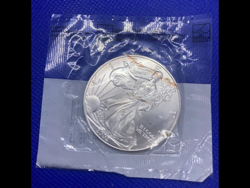 2002 1 oz Silver American Eagle Uncirculated 4974.81 in Littleton Holder Defect