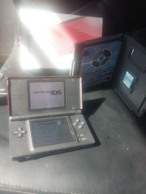 Red Nintendo DS lite with charger & Flash Focus game