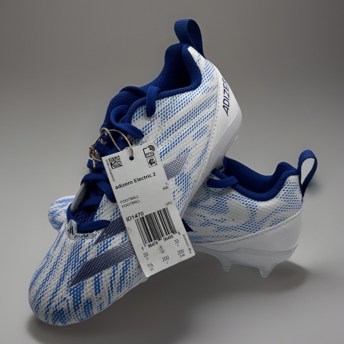 blue and white youth football cleats