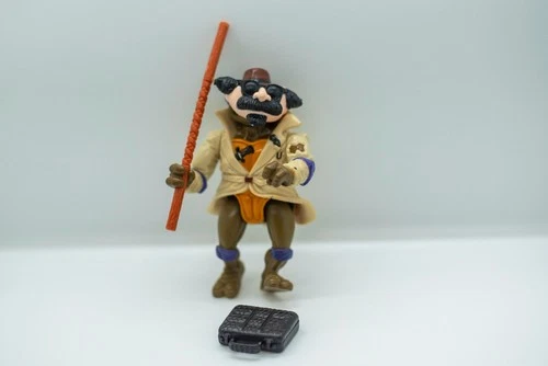 Vintage TMNT Don the undercover turtle. complete w/h accessories.  Gun is broken