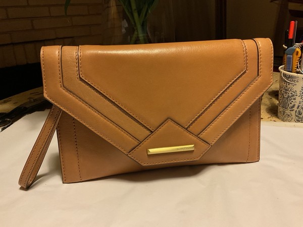 a MIMCO leather clutch bag