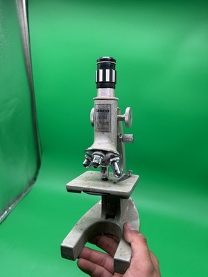 vintage Tasco 50-1200x zoom microscope