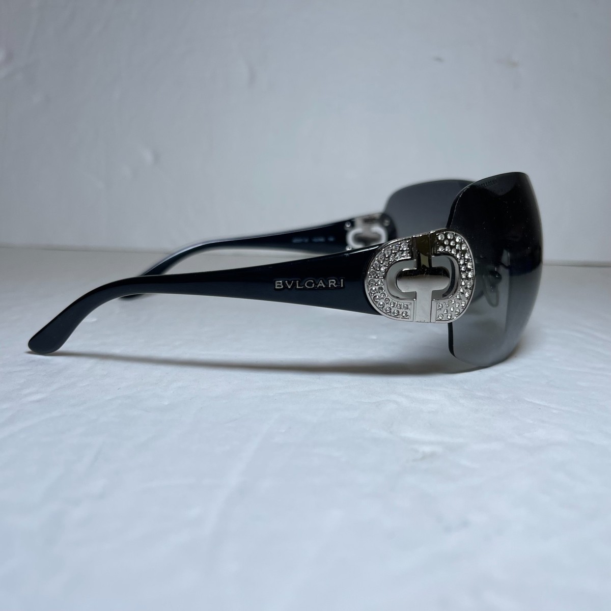 Bvlgari Shield Sunglasses Black Gradient Rimless Crystal Logo