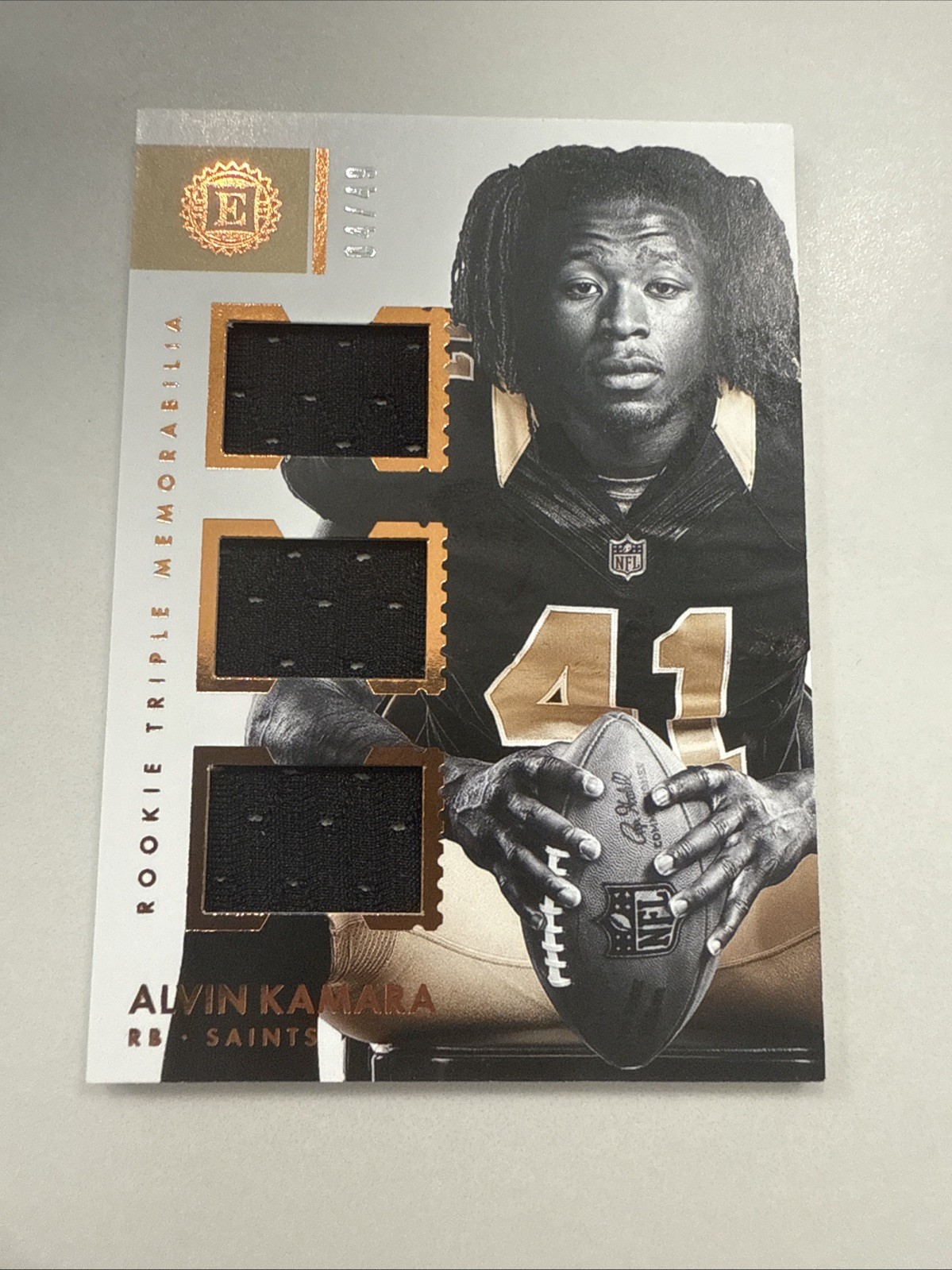 2017 PANINI ENCASED TRIPLE MEMORABILIA ALVIN KAMARA ROOKIE #4 SAINTS /49 RC
