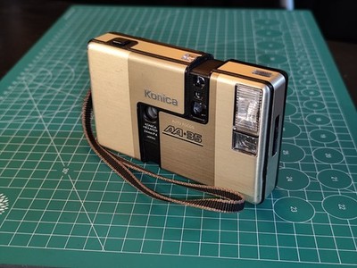 Konica AA-35 Halbformat Kamera Champagner Edition, analog, 72 Bilder pro Film