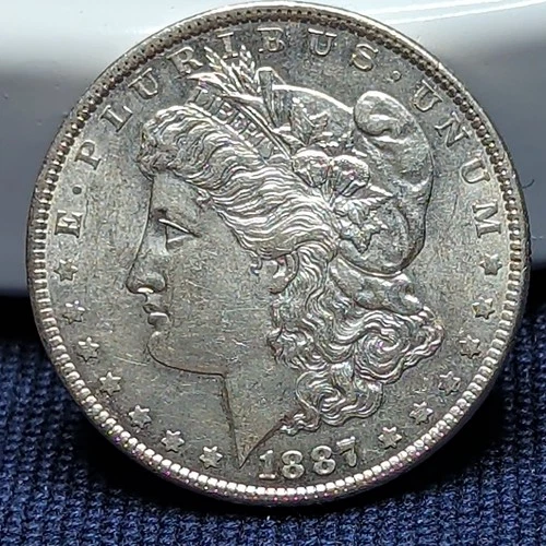 1887 $1 Morgan Silver Dollar Uncirculated RAW Excellent Luster Nice Coin #157