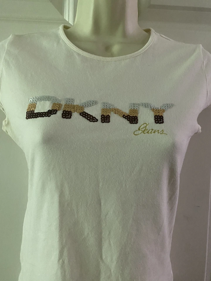 Pantalones de mezclilla DKNY marfil liso manga corta talla L para niñas jóvenes Foto 2 de 4