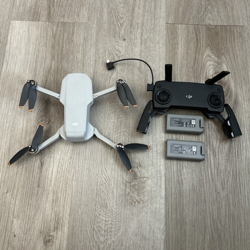 DJI Mini SE Drone Ultra Light 249g w/ Phone Controller 2 Batteries Untested READ