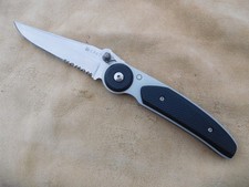 CRKC "Michael Walker" folding knife with thumb button lock