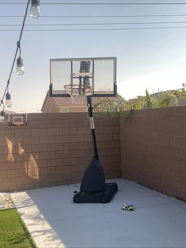 Sistema de baloncesto portátil híbrido Spalding NBA tablero trasero acrílico 60" Foto 2 de 2