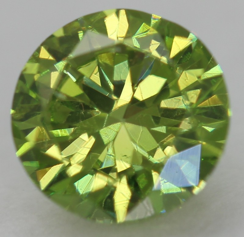 Cert 0.53 Carat Vivid Green VVS1 Round Brilliant Natural Enhanced Diamond 5.18mm