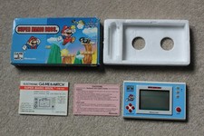 Thumbnail of ebay&reg; auction 168249203066 | VERPACKTES NINTENDO GAME & WATCH SUPER MARIO BROS YM-105 1988 GUTER ZUSTAND