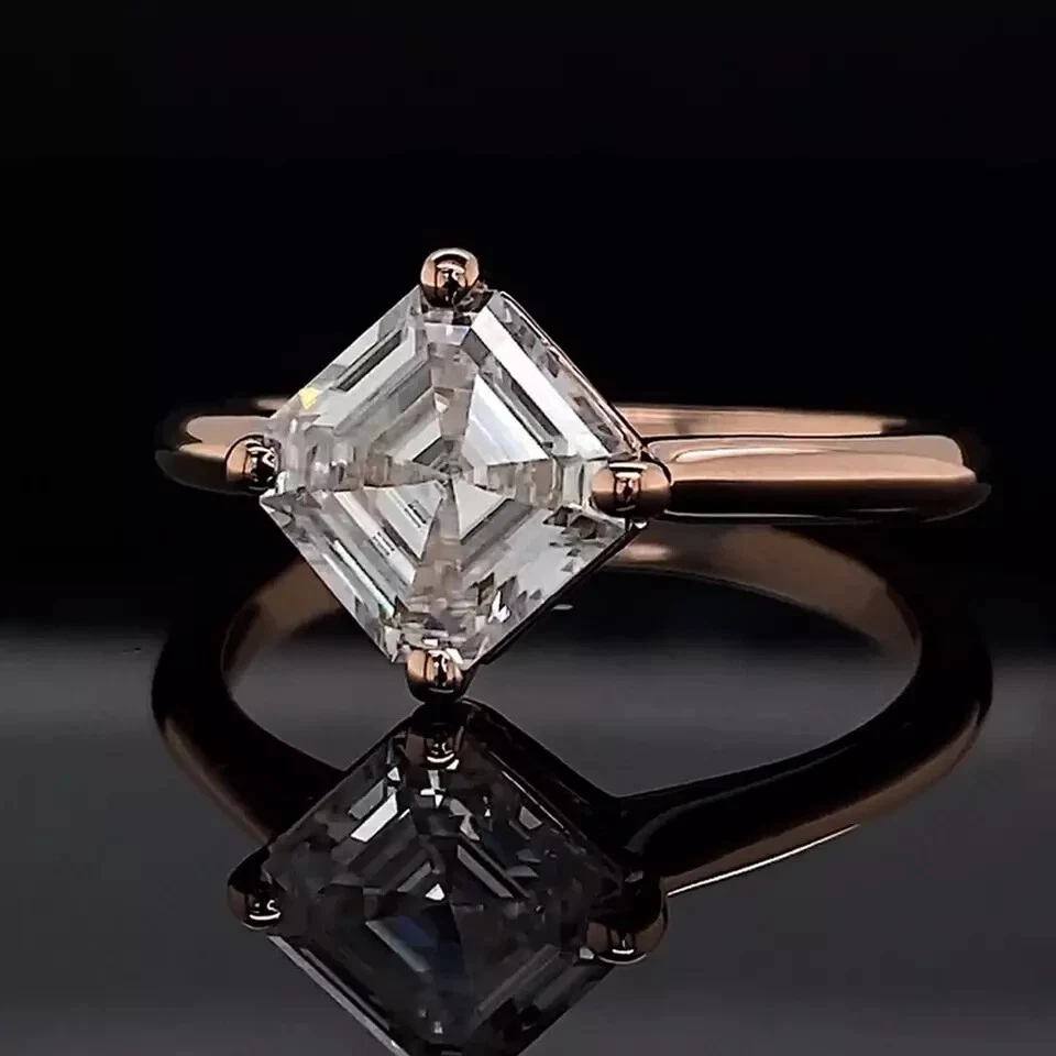 Anillo de compromiso Asscher Moissanite East West 1,70 TCW enchapado en oro rosa de 14 k Foto 2 de 4