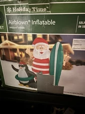 HOLIDAY TIME 4 FT AIRBLOWN INFLATABLE SANTA & Penguin surfboard INDOOR/OUTDOOR