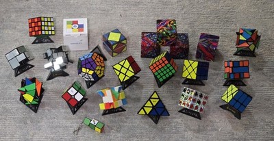 Huge Rubiks Cube & Misc Speed Cube Lot Cubes And Pyramids & More Used W/Stands