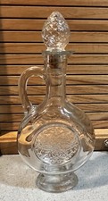 1960s Avon Skin So Soft Bath Oil Glass Decanter with Stopper. Approx 10" Tall.